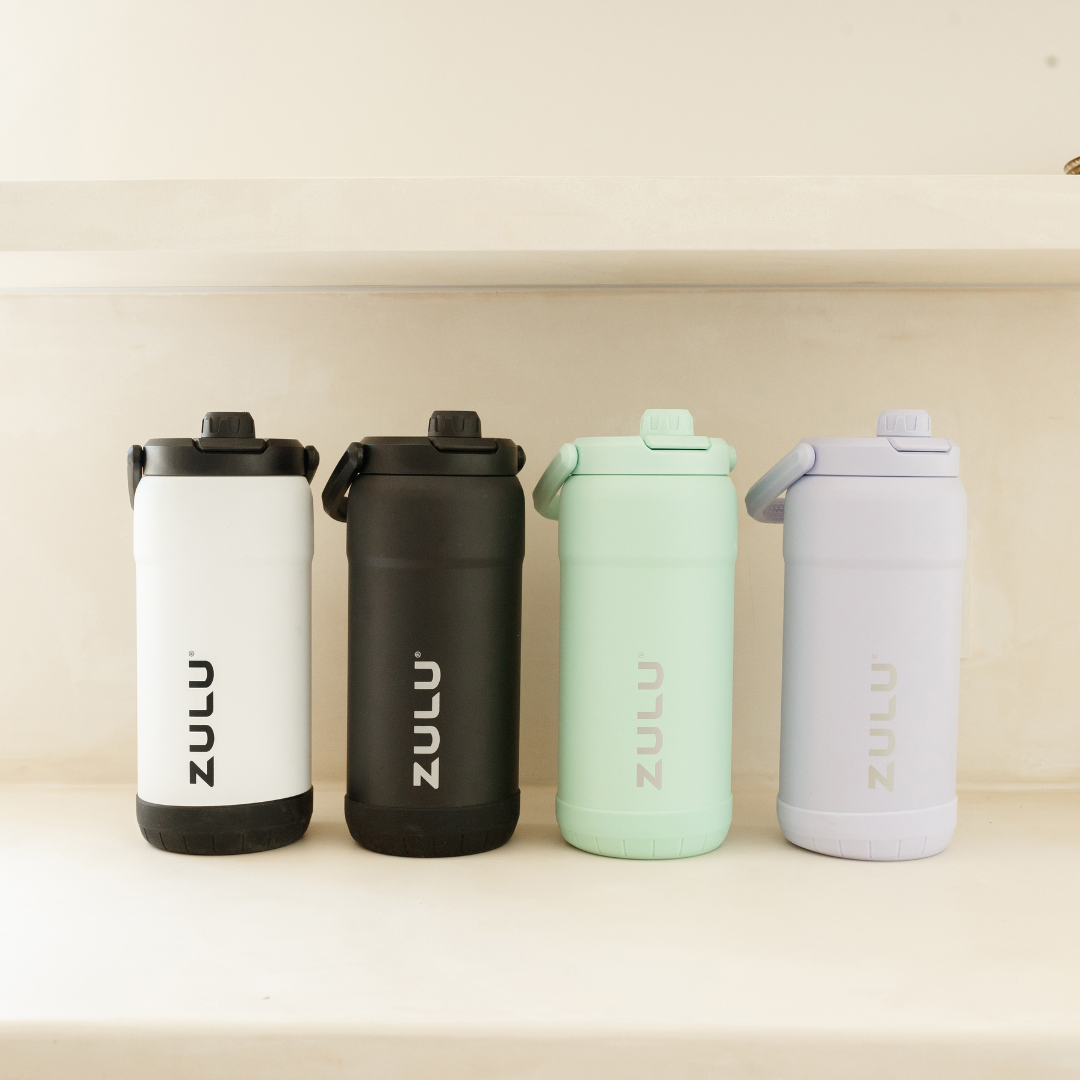 goals-mammoth-101oz-stainless-steel-bottle-i9 GoalsMammothAllColorsLifestyle.png